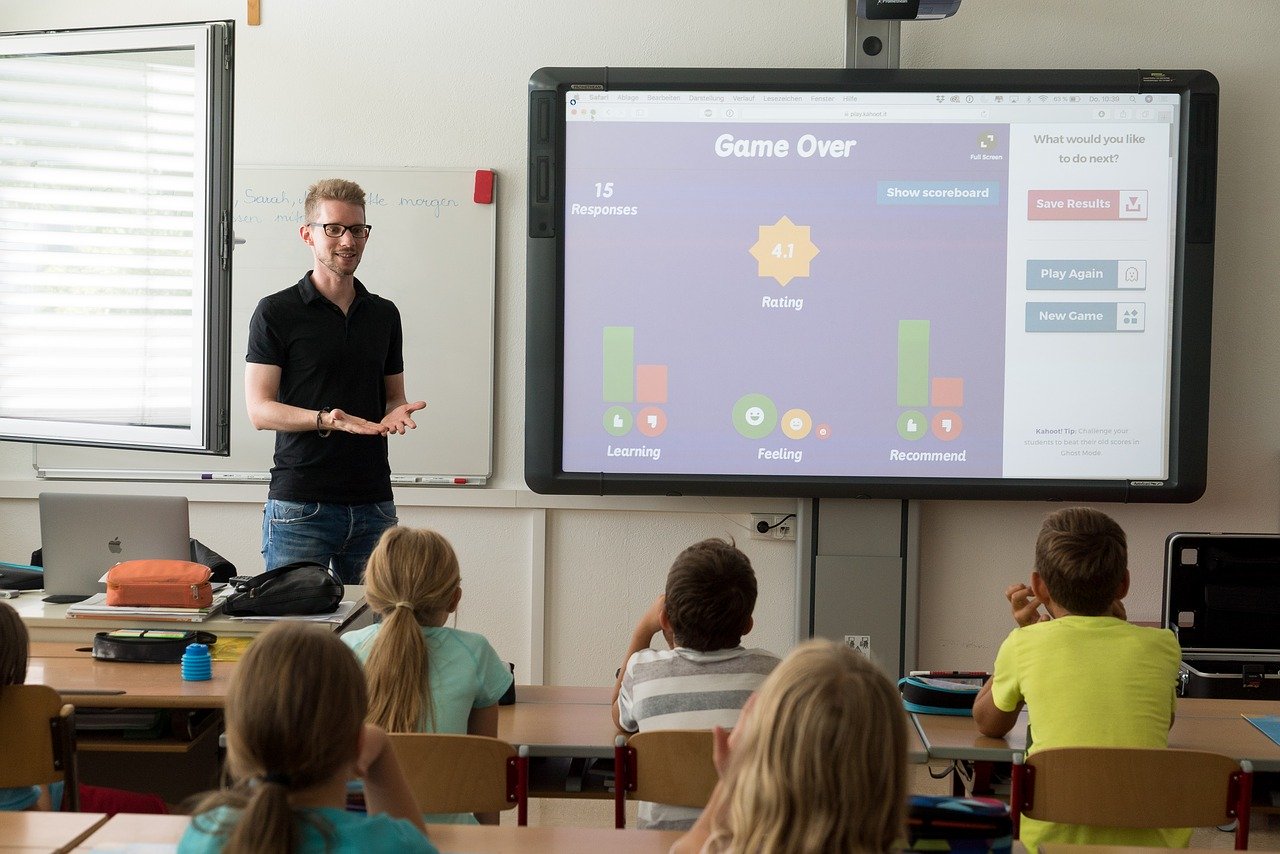 teacher-standing-in-front-of-classroom