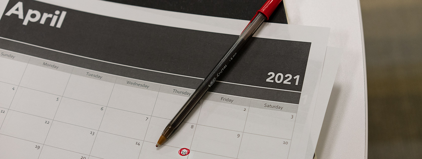April-2021-calendar-page-with-15th-circled-in-red-pen