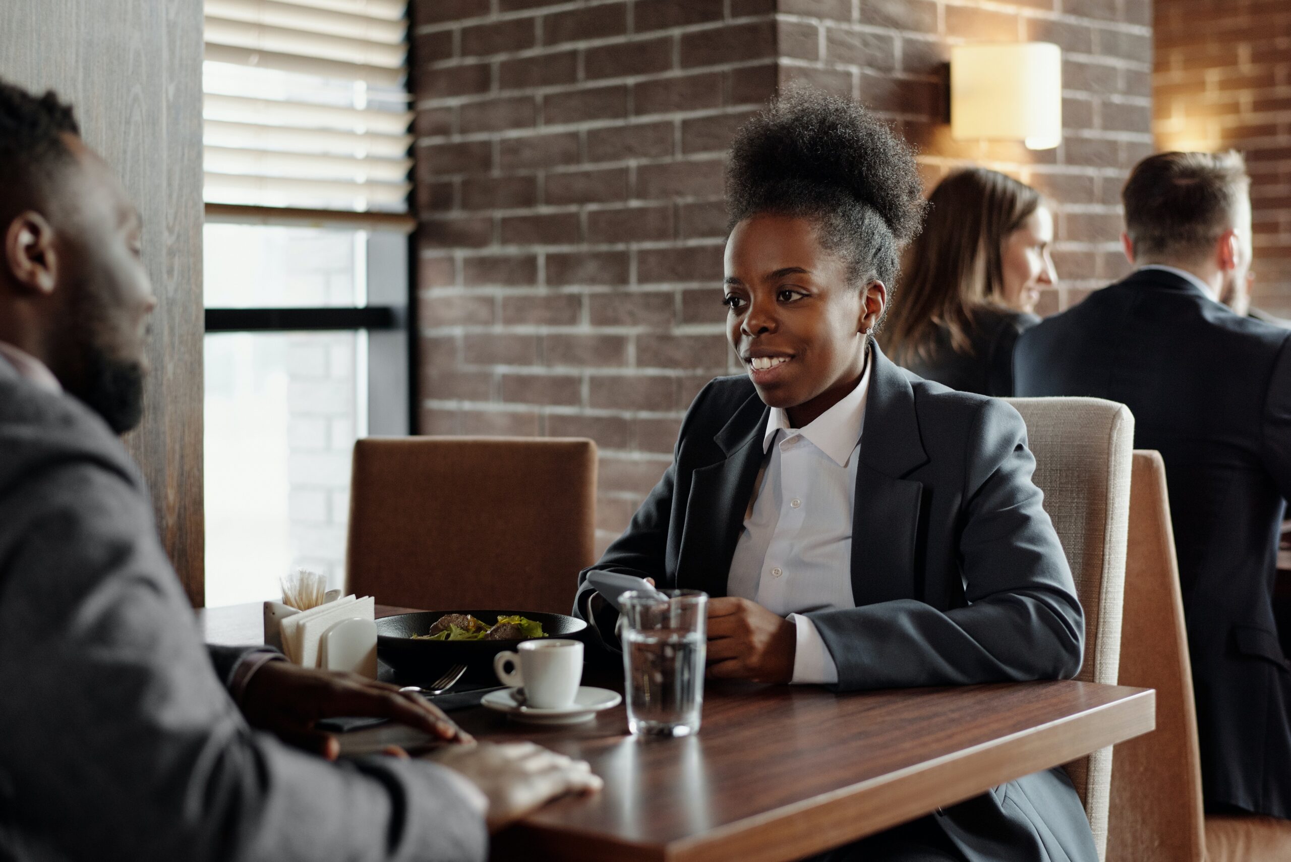 Woman and man having a business lunch at a restaurant